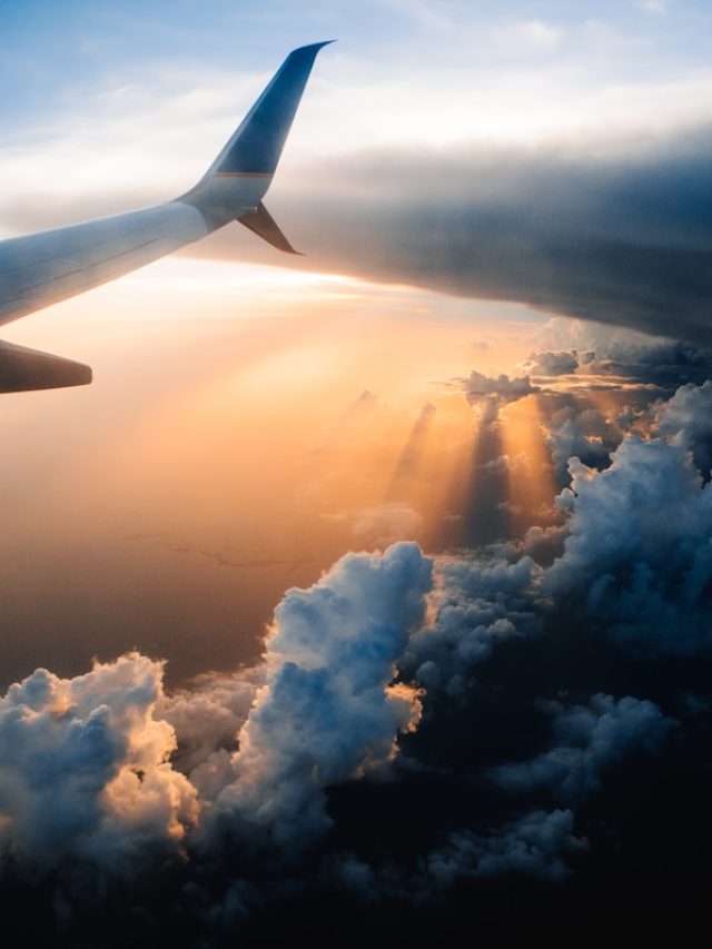 airplane on sky during golden hour