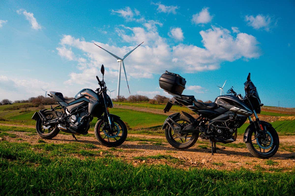 Motorbikes and Wind Turbine in Countryside
